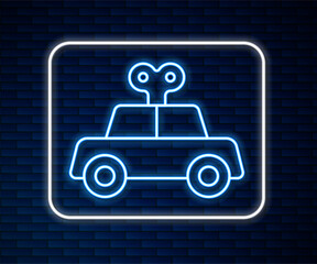 Canvas Print - Glowing neon line Toy car icon isolated on brick wall background. Vector