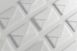 Top view of a geometric arrangement of white envelopes casting soft shadows