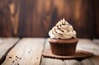 Appetizing chocolate cup cake with cream.