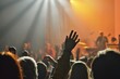 © Татьяна Евдокимова - Excited audience at a live music concert with energetic crowd cheering and raising their hands in silhouette. Enjoying the entertainment and celebration of the event