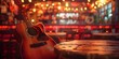 A guitar is sitting on a table in a bar. The bar is dimly lit and has a cozy atmosphere