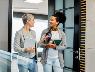 Wall Mural - business meeting businesswoman woman young office presentation colleague teamwork document papers hallway corridor tablet computer standing walking