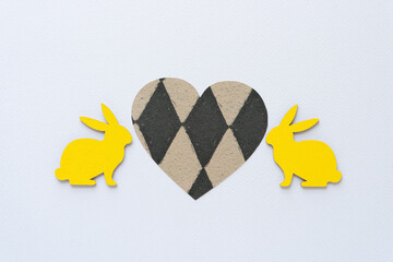 Poster - two yellow bunnies facing a paper heart with diamantine pattern