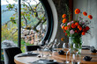 © yaqui_villegas - A restaurant's dining table features a stunning bouquet, fine glassware, and a scenic view, inviting a sense of luxury and tranquility