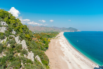 Wall Mural - Olympos beach. Aerial view of Olympos beach on a sunny day. One of the most beautiful beaches in Turkey.