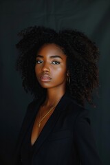 Wall Mural - Woman With Curly Hair in Black Jacket