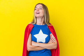 Wall Mural - Super Hero Romanian woman isolated on yellow background happy and smiling