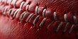 close up view of cricket ball made with red ribbon of leather.