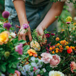 Care of flowers. women's hands arrange flower garden