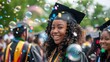 © SayLi - group of people celebrating university college graduation wearing black cap and throwing them up in the air outdoors. black african american girl. happy atmosphere. wallpaper background