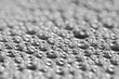 © freeman83 - Abstract gray macro background with lots of soap bubbles.