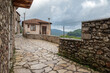 Street view of Dimitsana village in Arcadia, Peloponnese, Greece. Narrow cobblestone alleys.