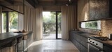 Fototapeta Sport - Modern kitchen in raw concrete style, brick walls with black frames, open door to the garden and cream curtains on the windows