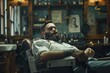 A bearded man, seated in a barbershop armchair, awaits his haircut