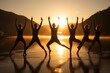 © Viktor  Shmihinskyi - Yoga class at sunset on the beach.