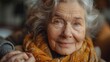 © Zaleman - A smiling senior woman holds the hand of a male caregiver