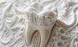 Decorated artificial tooth on a white background