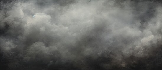 Poster - A grey, cloudy sky filled with smoke creating a dark and ominous atmosphere. The cumulus clouds blend with the smoke, blending into a monochrome landscape