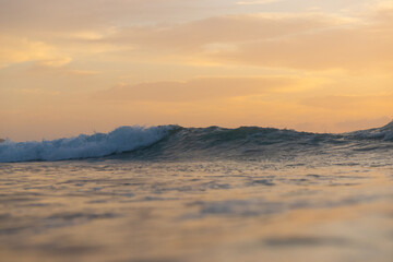 Canvas Print - ocean view with orange sunrise sky.