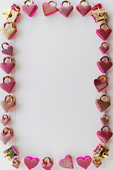 Sticker - an exquisite page border featuring heart shaped padlocks in pink and gold around a centered large white rectangular space, Valentineâ€™s Day inspired border, precise lines and exquisite detail, smooth