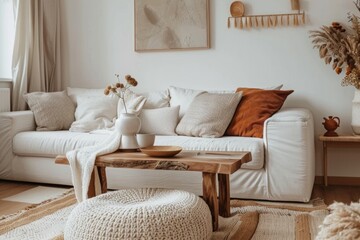 Wall Mural - Cozy living room interior with knitted blanket on comfortable sofa