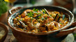 Delicious seafood paella in traditional clay pot