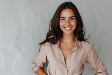 Wall Mural - Professional Woman in Business Casual Attire Posing with Confidence Against a Neutral Background