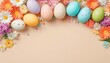 Easter eggs and flowers on a beige background with copy space, Easter Day