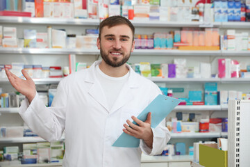 Poster - Professional pharmacist with clipboard in modern drugstore