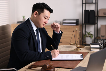 Wall Mural - Notary writing notes at wooden table in office