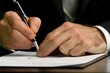 © FACTORY GRAPHICA  - business poeple write white pen on aggrement paper contract