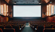 empty cinema hall with chairs and blank screen