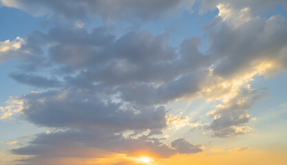 Wall Mural - Sunset sky. Abstract nature background. Dramatic blue with orange colorful clouds in twilight time.