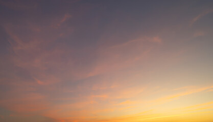 Wall Mural - Sunset sky. Abstract nature background. Dramatic blue with orange colorful clouds in twilight time.
