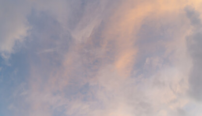 Wall Mural - Sunset sky. Abstract nature background. Dramatic blue with orange colorful clouds in twilight time.