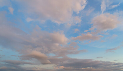 Wall Mural - Sunset sky. Abstract nature background. Dramatic blue with orange colorful clouds in twilight time.