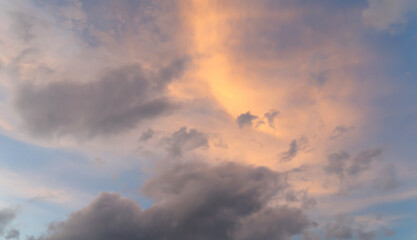 Wall Mural - Sunset sky. Abstract nature background. Dramatic blue with orange colorful clouds in twilight time.