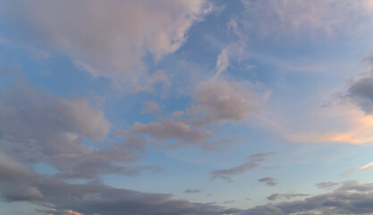 Wall Mural - Sunset sky. Abstract nature background. Dramatic blue with orange colorful clouds in twilight time.