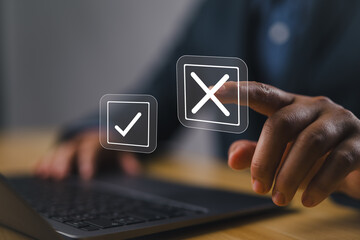 Sticker - Select the wrong mark on a laptop. check right and wrong marks. concept decide to choose vote. yes or no decisions, and business options for difficult situations in dilemma.