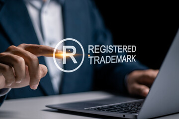 copyright protection concept. registration or registration for trademark. businessman using laptop w