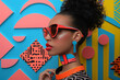 Abstract pop art collage of a beautiful woman on colorful paper background, female fashion model, young beautiful social media trendy style wearing sunglasses on a blue background
