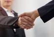 © SASITHORN - Businessteam of deal which handshake man and Success concept of handshaking after successful deal job