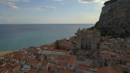 Wall Mural - Drone view from above at the old town of Cefalu at sunset, medieval village of Sicily island, Province of Palermo, Italy. Europe. Cathedral of Cefalu Italy view from above