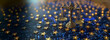 Scales of Justice Illuminated on European Union Stars with Technology Circuit AI-Generated