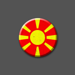 Wall Mural - Metal Round badge in the colors of the North Macedonia flag. Isolated on grey background. Design element. 3D illustration. Signs and symbols