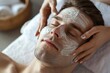Man Receiving Back Massage With Foam on Face