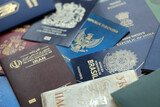 Fototapeta  - Many various passports of citizens of different countries and regions of the world close up