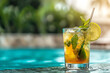Fresh cool alcoholic cocktail with tequila, orange juice, ice and mint by pool. Mojito. Refreshing drink, lemonade or ice tea in glass. Copy space for text. AI Generative