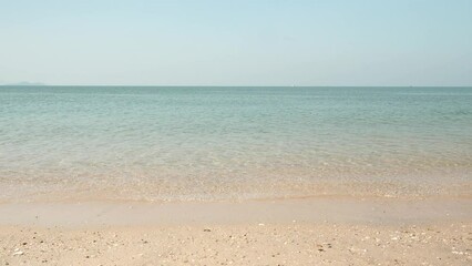 Wall Mural - horizon with sky and white sand tropical. wave sea of the on a beach sand background.