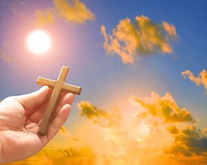 Wall Mural - Cross in arm at sunset. Good Friday concept. 3d illustration